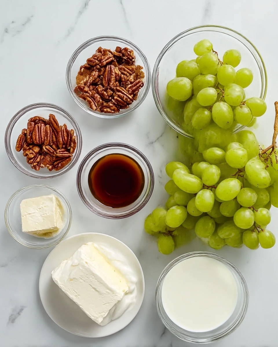 The image shows ingredients laid out on a white marbled surface: a clear bowl full of green grapes on the right, a small clear bowl of dark brown liquid above it, and to the left, small clear bowls filled with brown sugar and pecans. Below them, there is a larger clear bowl of white creamy yogurt, a small white plate with a block of cream cheese, and a clear bowl with a white liquid, likely milk, all arranged neatly. The overall colors are green, brown, and white with a clean, fresh look. photo taken with an iphone --ar 4:5 --v 7