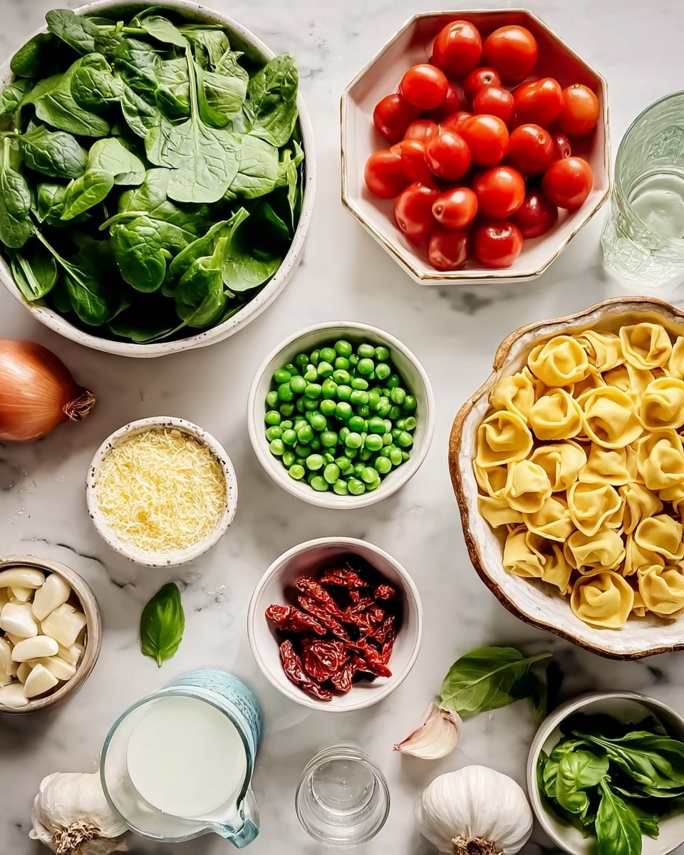 The image shows a collection of small white bowls arranged on a white marbled surface, each bowl filled with different fresh ingredients. Starting from the top left, there is a large white bowl full of fresh green spinach leaves. To the right, a small white octagonal bowl is filled with bright red cherry tomatoes. Next to that, a small white bowl contains green peas, while another large white bowl holds yellow tortellini pasta. Toward the bottom left, a small white bowl shows a light yellow powdery cheese, and near it, there is a small white bowl with dried red sun-dried tomatoes. In the middle bottom, a small white bowl holds peeled garlic cloves, and beside it, another small white bowl contains fresh green basil leaves. There is also a glass with white liquid, a small empty glass, and some shallots on the surface. The layout presents a colorful mix of fresh and dried ingredients with natural textures and soft light. Photo taken with an iphone --ar 4:5 --v 7