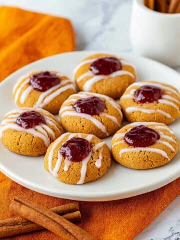 Gingerbread Thumbprint Cookies with Cranberry Sauce and White Chocolate Drizzle Recipe