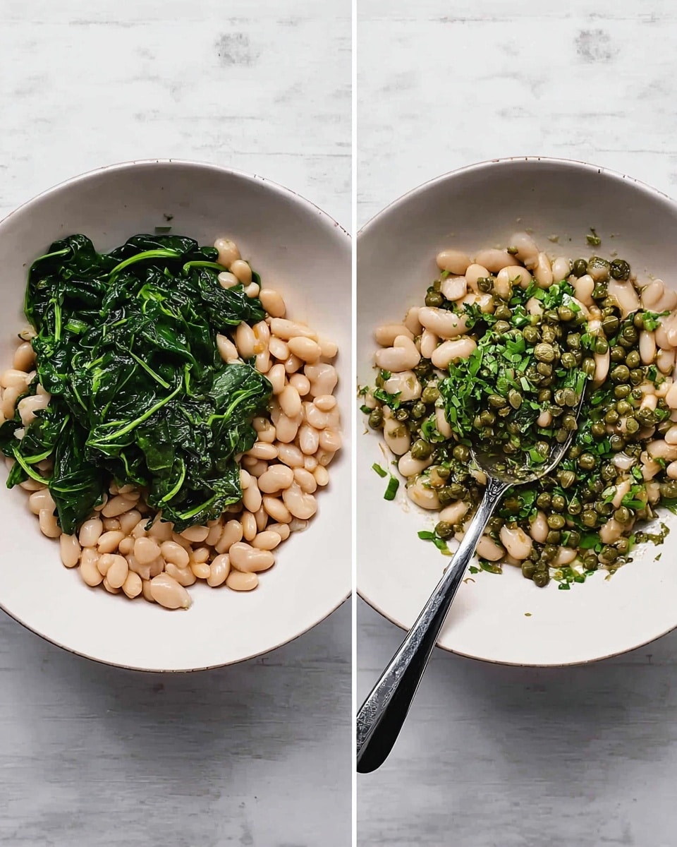 Two side-by-side images show a white bowl with three main layers. The bottom layer is light beige white beans spread evenly. On top of the beans, there is a layer of dark green spinach leaves, slightly wilted, scattered through the beans. In the second image, a third layer is added, which is a mix of small green capers and finely chopped bright green herbs placed mostly in the center but spread slightly over the beans and spinach. A silver spoon with a long black handle rests on the right side inside the bowl in the second image. The bowl is on a white marbled surface. Photo taken with an iphone --ar 4:5 --v 7