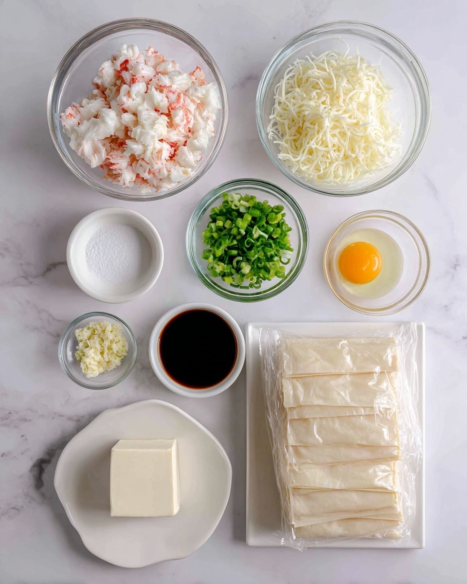 A flat lay of cooking ingredients is shown on a white marbled surface. The top row has three clear glass bowls: the left one filled with pink and white chopped imitation crab, the middle one holding shredded pale yellow mozzarella cheese, and the right one containing bright green chopped green onions. Below these are five small dishes: on the left, a small white bowl with granulated sugar; next to it, a small white bowl with minced light yellow garlic; in the center, a small white bowl holding dark brown soy sauce; to the right, a clear bowl with a single raw yellow egg yolk and translucent egg white; below on the left, a white plate with a block of cream cheese; and at the bottom right, a rectangular stack of pale beige puff pastry sheets wrapped in clear plastic. Each item is spaced neatly, creating an organized and clean layout. Photo taken with an iphone --ar 4:5 --v 7
