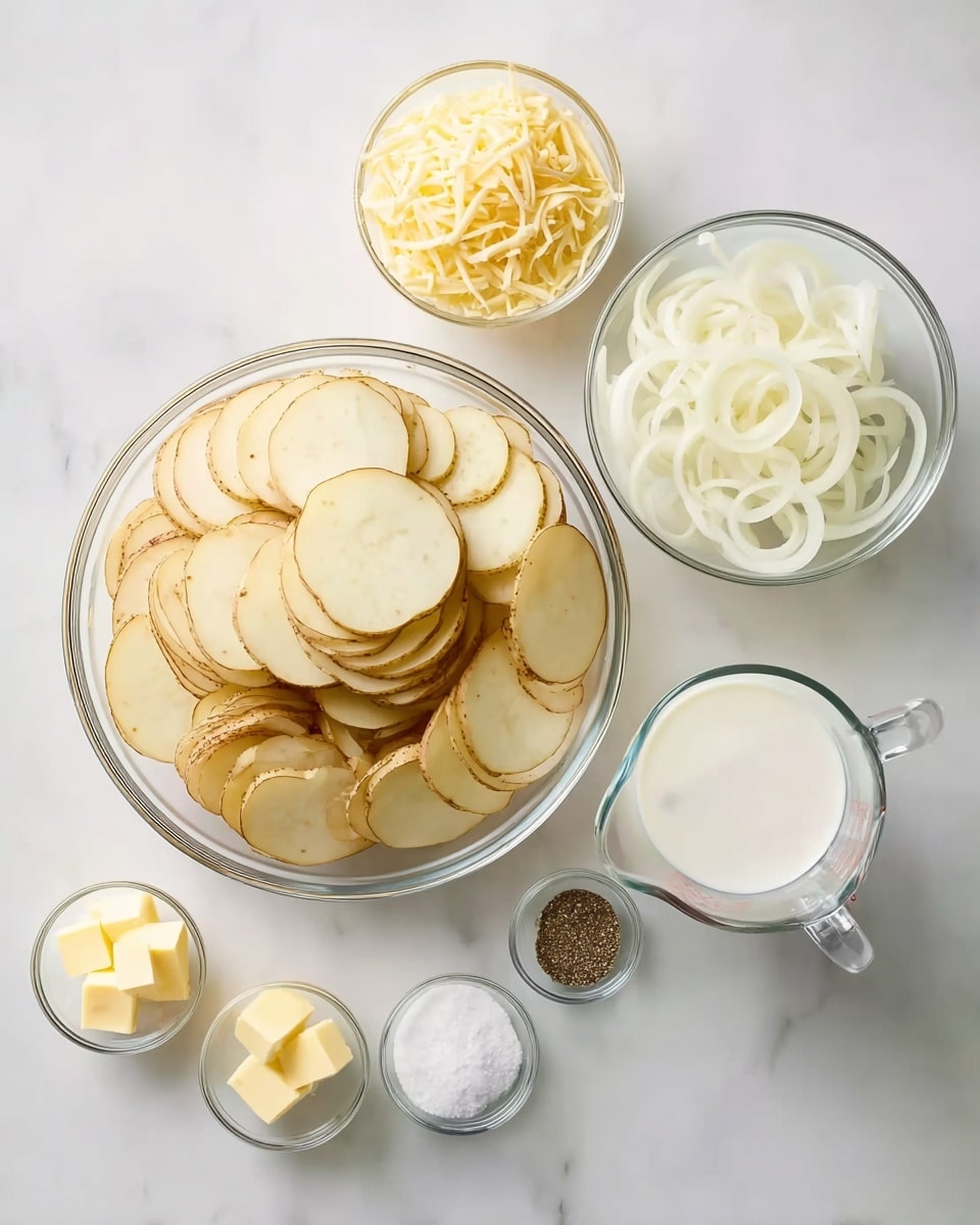 A clear glass bowl sits at the center, filled with layers of thin, round slices of potato, pale yellow with light brown edges, stacked in a neat circular pattern. To the top left of the bowl is a smaller clear bowl overflowing with shredded yellow cheese. To the right of the cheese is another clear bowl holding thin, white onion rings layered loosely. At the far right is a clear glass measuring cup filled with white milk. Small clear bowls containing white flour, white salt, black pepper, and yellow butter cubes are arranged in a neat column on the left side. All items rest on a smooth white marbled surface. Photo taken with an iphone --ar 4:5 --v 7