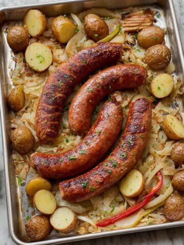Sheet Pan Hasselback Kielbasa with Roasted Potatoes and Vegetables Recipe