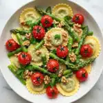 Ravioli with Tomatoes, Asparagus, Garlic, and Herbs Recipe