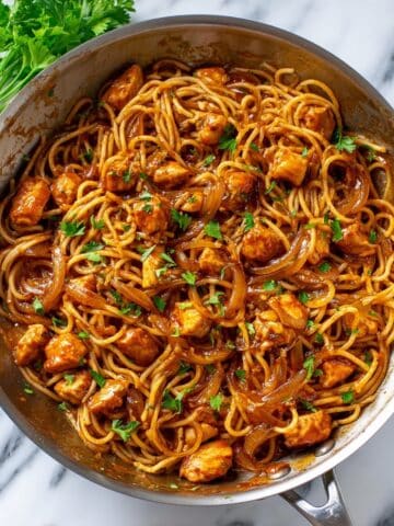 Chicken Scallopini with Tomato-Bacon Gravy and Sautéed Onions over Spaghetti Recipe