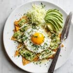 Green Salsa Verde Chilaquiles with Fried Eggs and Fresh Toppings Recipe