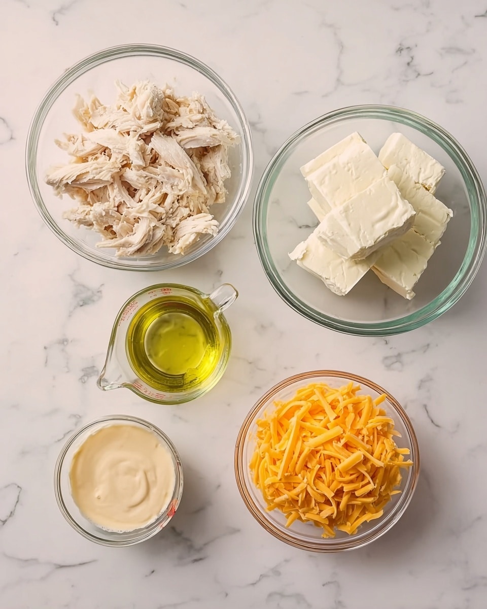 The image shows five clear glass bowls arranged on a white marbled surface. The largest bowl on the left contains shredded light beige chicken. To its right, a medium bowl holds several large blocks of cream white cream cheese. Below the chicken, a small bowl with a thick beige sauce sits. In the center, a glass measuring cup holds a pale yellow liquid, possibly oil. On the right side, a small bowl is filled with orange shredded cheddar cheese. The setup looks clean and organized, ready for mixing, photo taken with an iphone --ar 4:5 --v 7