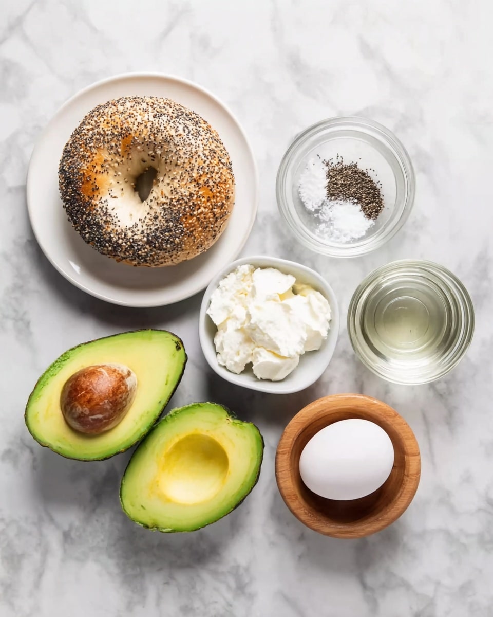 The image shows ingredients arranged neatly on a white marbled background: a whole everything bagel on a white plate at the top left, two avocado halves with bright green flesh at the bottom left, a white egg on the right side, and small white and wooden bowls containing cream cheese, clear water, black pepper, and salt spread around the center. photo taken with an iphone --ar 4:5 --v 7