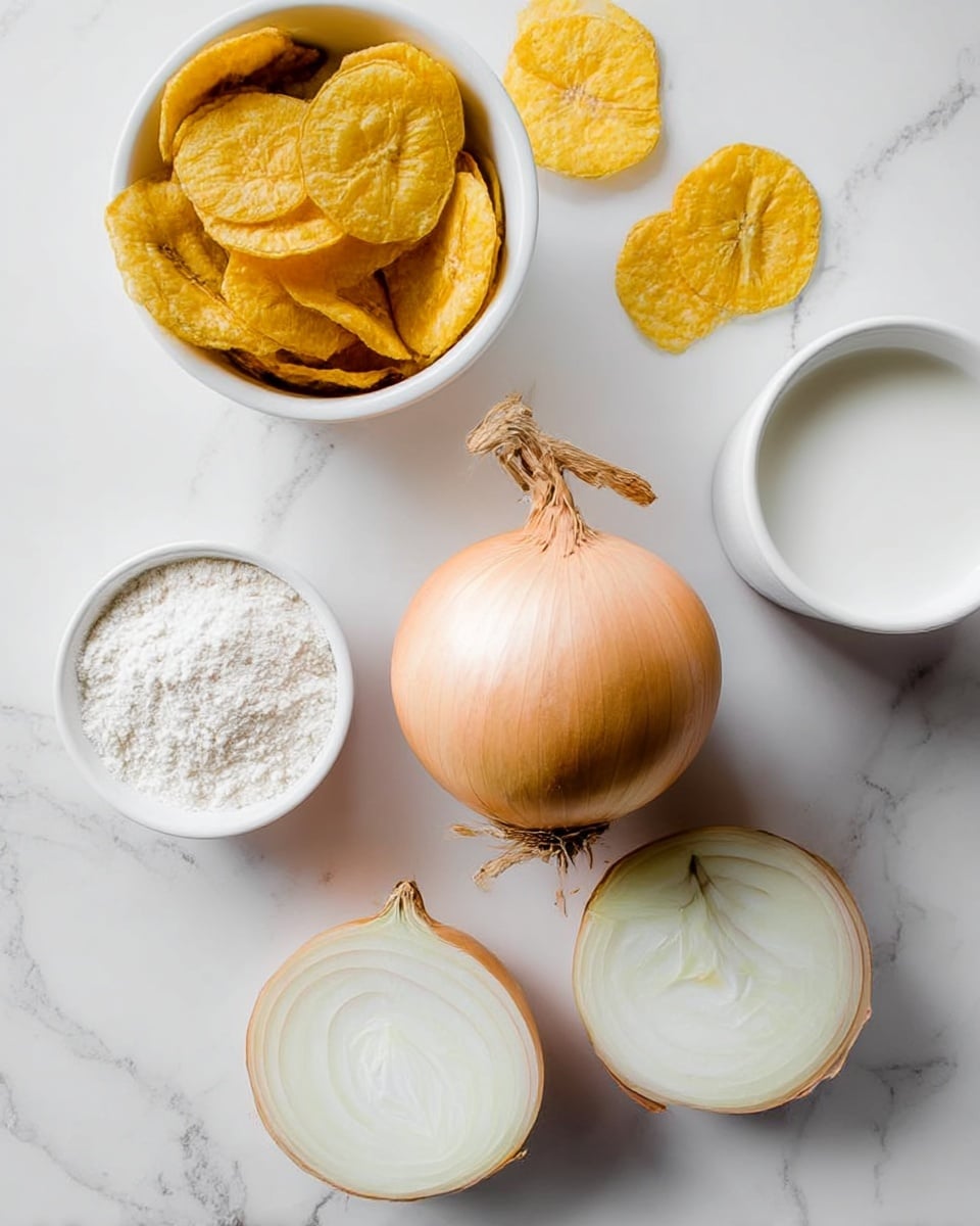 The image shows five food items placed on a white marbled surface. In the center is a whole yellow onion with its light brown skin and dried stem. Surrounding it are two onion halves, revealing layered white and pale yellow flesh inside. On the upper left is a white bowl filled with crispy yellow round plantain chips. On the lower left is a small white bowl filled with white flour. On the upper right is a white cup filled with a white liquid, likely milk or cream. The items are arranged loosely around the center onion in a scattered way. Photo taken with an iphone --ar 4:5 --v 7