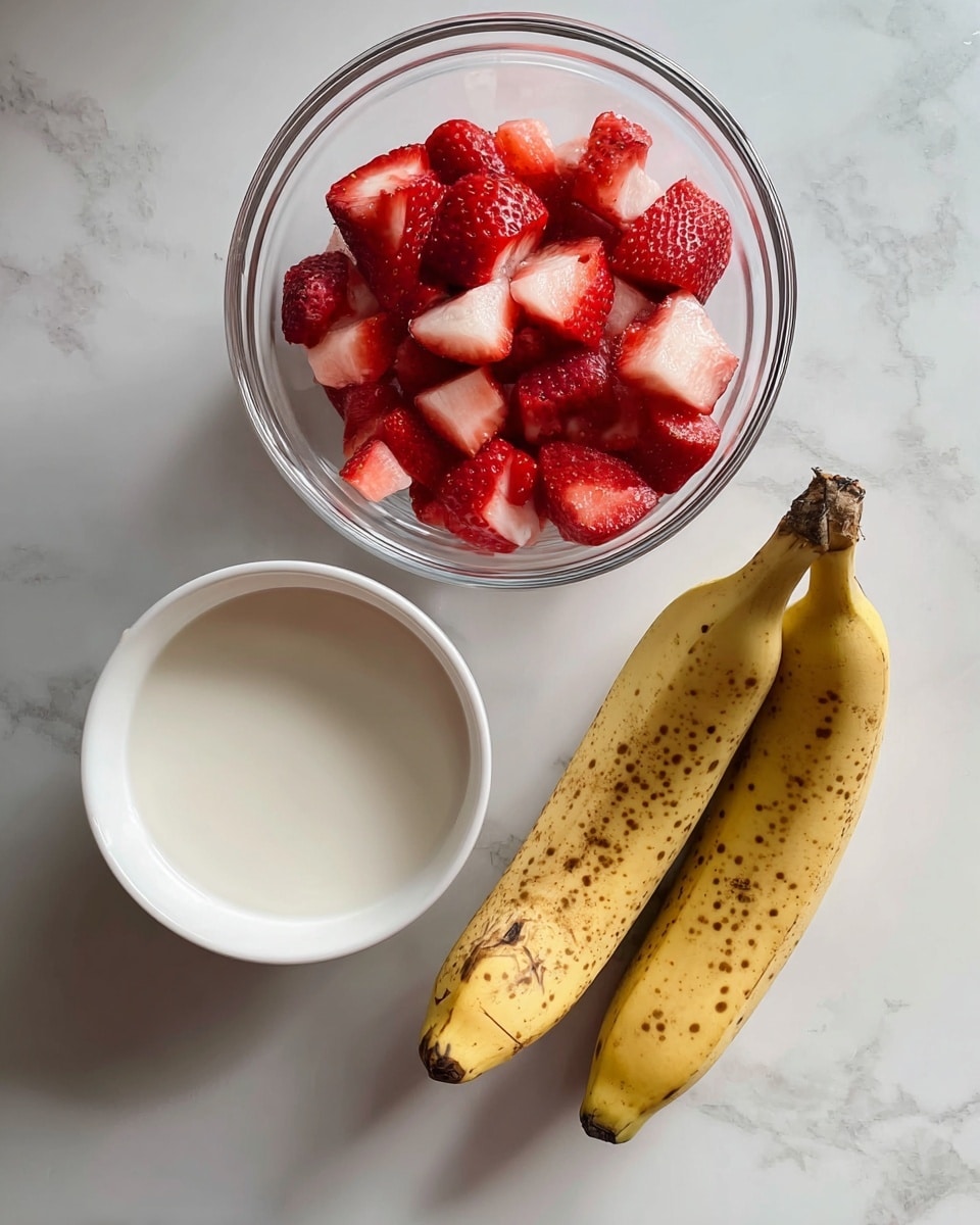 The image shows three items on a white marbled surface: at the top right, a ripe banana with brown spots; at the bottom, a clear glass bowl filled with chopped red strawberries; and at the top left, a white bowl holding white milk. Each item is neatly placed in a simple arrangement. Photo taken with an iphone --ar 4:5 --v 7