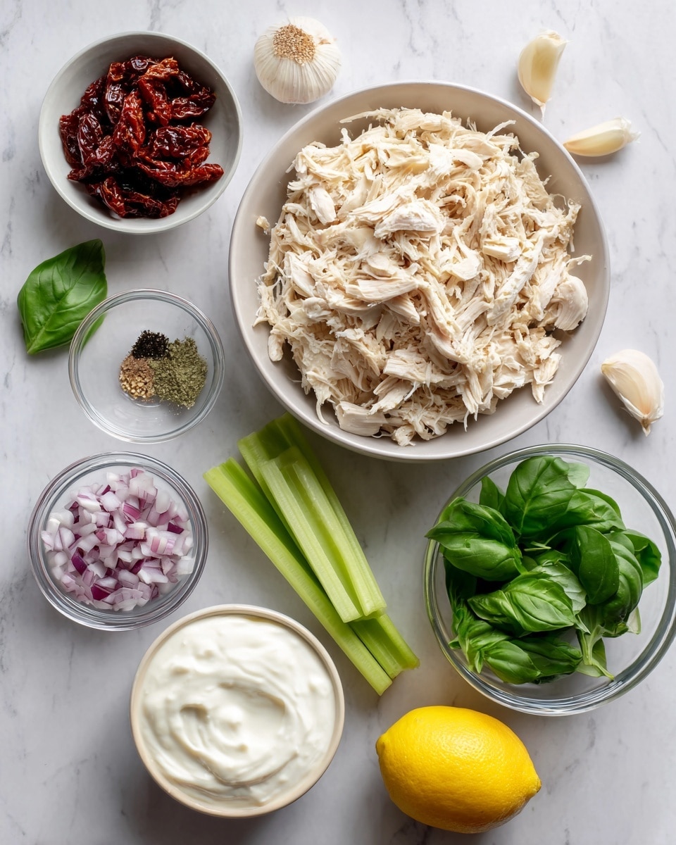 The image shows a white bowl filled with light-colored shredded chicken placed at the top, surrounded by smaller white bowls and items on a white marbled surface. Clockwise from the chicken, there is a bowl of smooth white mayonnaise, a small clear bowl of dark red sun-dried tomatoes, a whole yellow lemon, a pile of chopped purple onions in a clear bowl, a small pile of black pepper, fresh green basil leaves, three green celery sticks, a single clove of pale garlic, and a heap of plain white Greek yogurt in a white bowl near the center. The colors range from light beige and white in the middle to vibrant green, dark red, and yellow around the edges, presented neatly and clearly. photo taken with an iphone --ar 4:5 --v 7