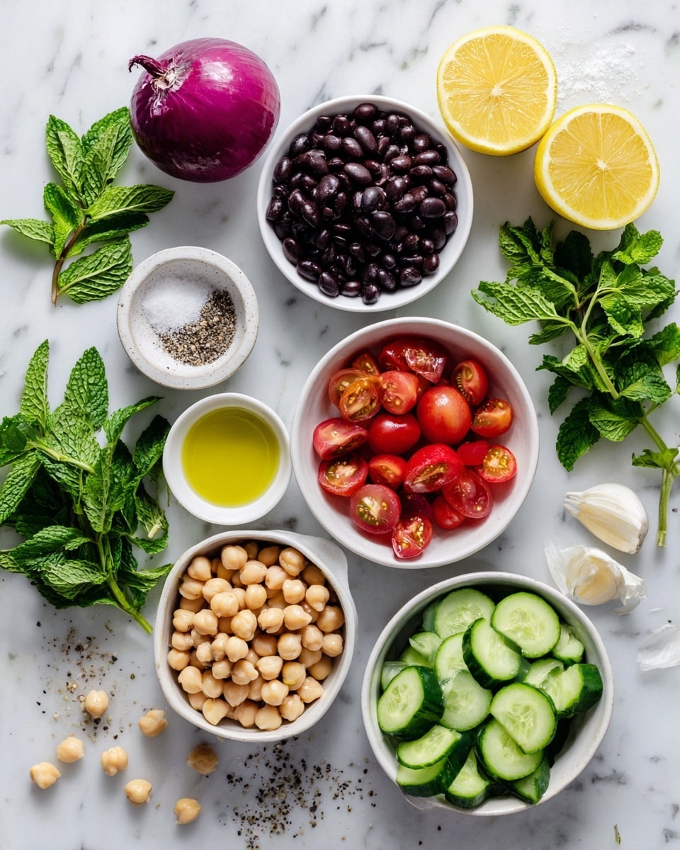 The image shows an arrangement of fresh ingredients on a white marbled surface. There are small white bowls filled with black beans, garbanzo beans, grape tomatoes, cucumbers, and fresh parsley. A whole red onion sits near the top left, while two halves of a lemon are placed on the top right. Fresh mint leaves are on the left side next to a small dish containing kosher salt and black pepper. A small white bowl of olive oil is at the bottom left. There are also several loose chickpeas and a couple of garlic cloves scattered near the garbanzo beans and parsley. The overall look is colorful, fresh, and ready for making a bright, healthy salad. photo taken with an iphone --ar 4:5 --v 7