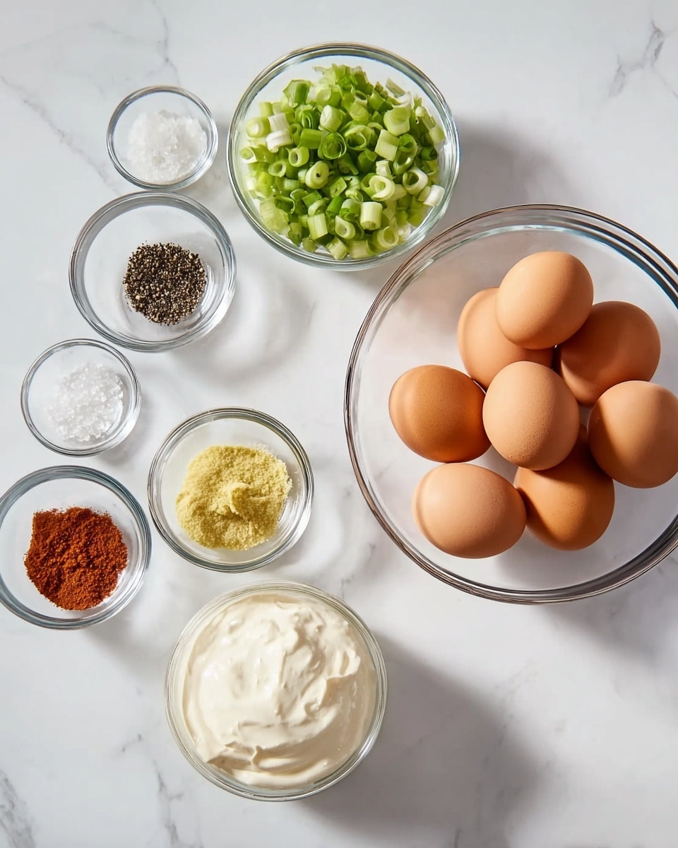 The image shows a white marbled surface with eight brown eggs in a clear glass bowl placed on the right side. Surrounding the bowl are six small clear glass bowls filled with different ingredients: green chopped scallions on the top left, black pepper with some white salt grains above the eggs, a reddish-brown spice powder below the pepper, yellow mustard to the left of the spice, white salt to the right of the eggs, and thick white mayonnaise at the bottom left. The arrangement is neat and the lighting is bright, highlighting the colors and textures clearly. photo taken with an iphone --ar 4:5 --v 7