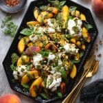 Grilled Peach Salad with Burrata, Pesto Croutons, and Fresh Herbs Recipe